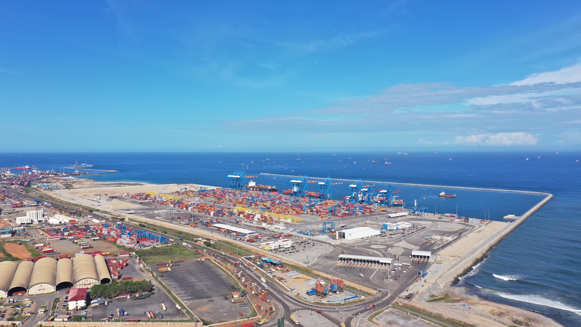 Aerial shot of the Tema seaport in Ghana under the cloudy skies